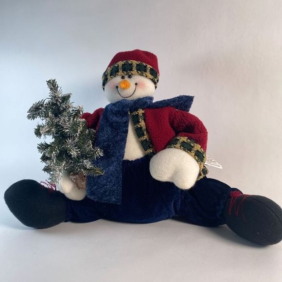 Plush Snowman holding artificial snow flocked tree. - Picture 2 of 9
